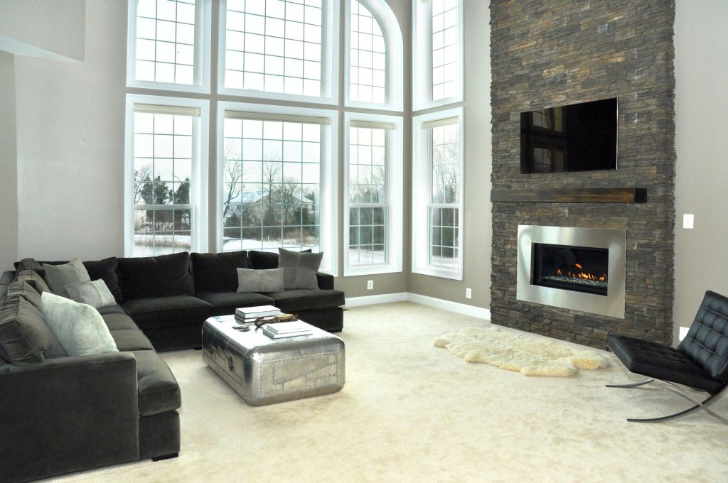modern fireplace designs with glass in monochrome themed room