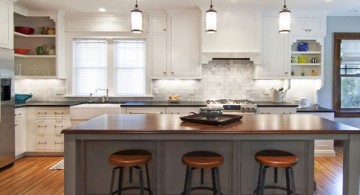 modern low mini pendant lights over kitchen island