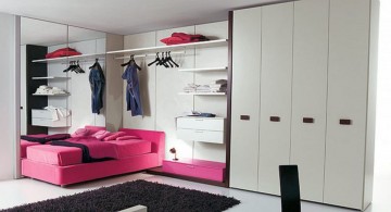 pink and black bedroom decor in plain white room
