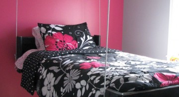 pink and black bedroom decor with hanging bed