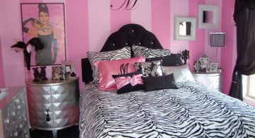 pink and black bedroom decor with vintage picture