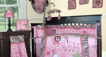 pink baby room ideas with safari quilt