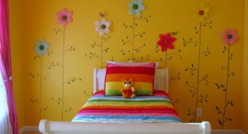 rainbow colored flowers on the wall cute girls bedroom ideas