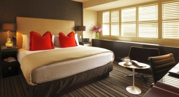 red and black bedroom with lattice rug