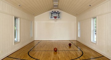 repurpose old garage for indoor home basketball courts