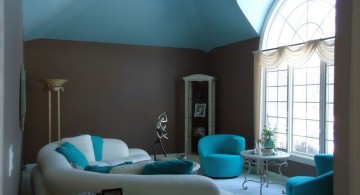 retro turquoise living room with dark walls