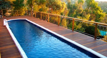 rooftop lap pool designs with wood deck