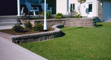 simple river stones for flower beds on front yard