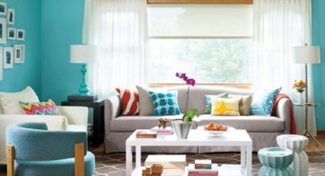 simple turquoise living room with modern acrylic coffee table