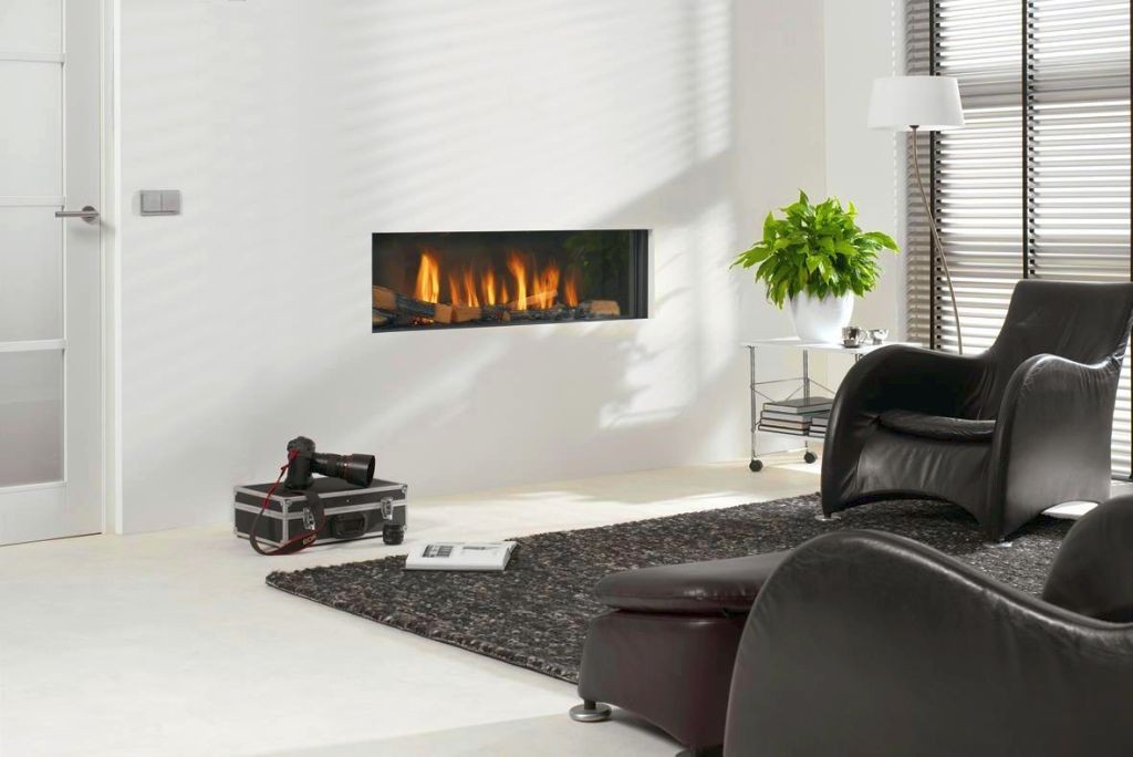sleek built in with black leather chairs modern white fireplace design
