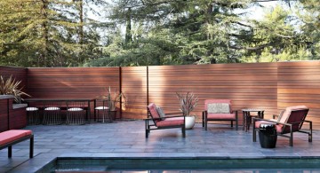 sleek modern deck design for poolside with sidepool chairs