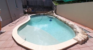 small kidney shaped swimming pools for narrow yard