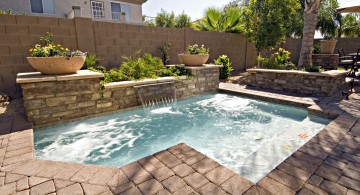 small pool with curtain style waterfall