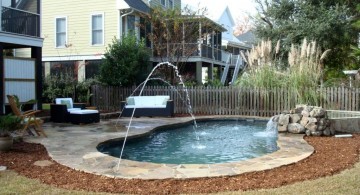 small pool with fountains and waterfall