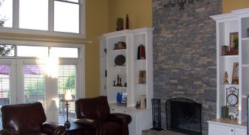 stack stone fireplaces for high ceilinged room