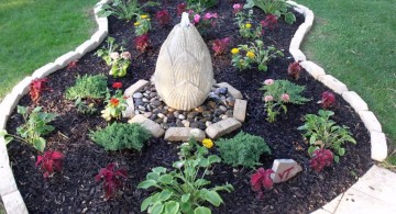 stones for flower beds with lotus fountain