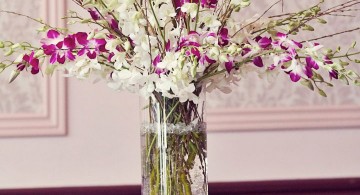 tall vase with branches and orchids