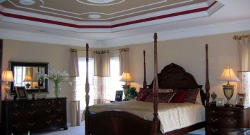 tray ceiling bedroom with four posts bed
