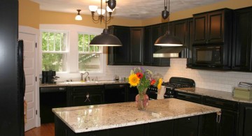 two blacks wide mini pendant lights over kitchen island