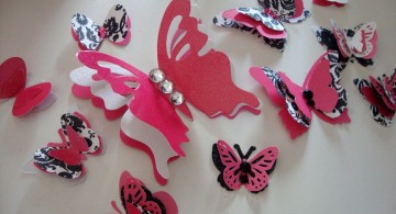 various sized butterflies pink and black wall decor