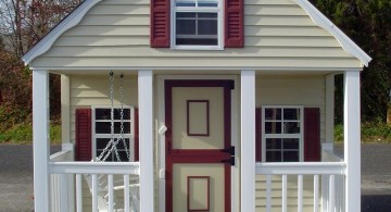 white cottage with swing at the porch luxury outdoor playhouse