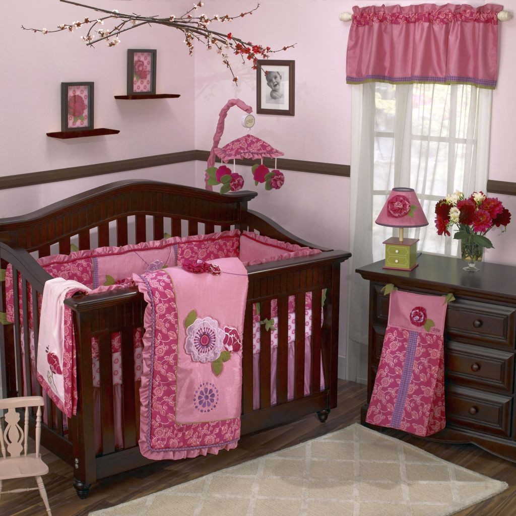 pink baby room ideas with wall art and wooden theme