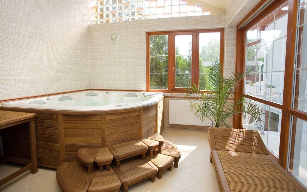 wooden bathroom designs with unique tub
