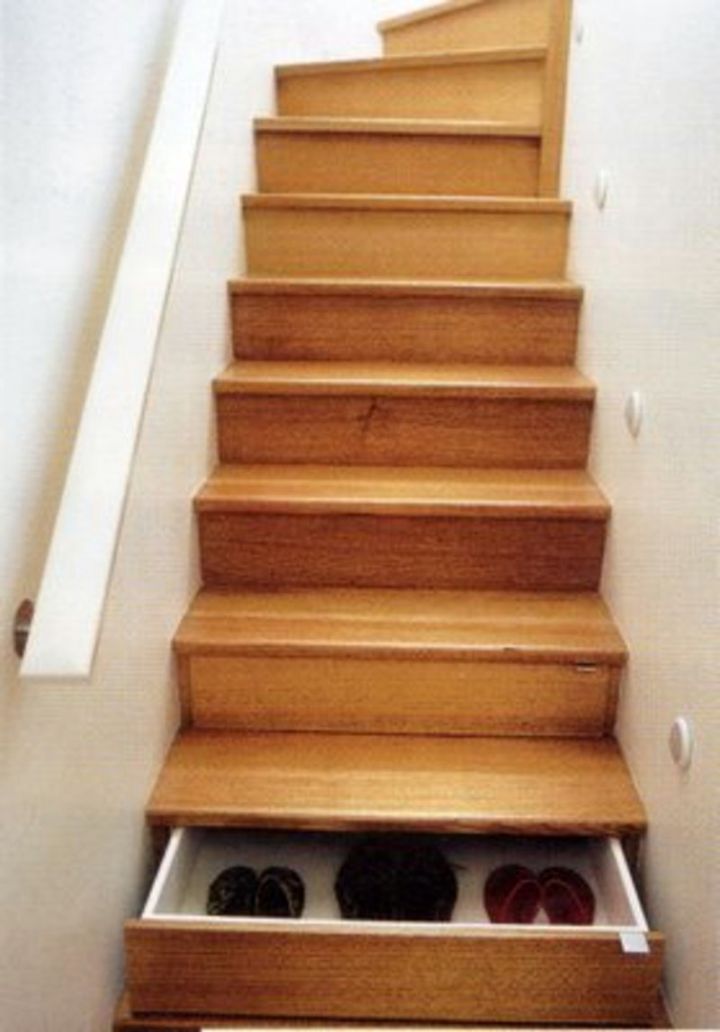 wooden stairs with storage box