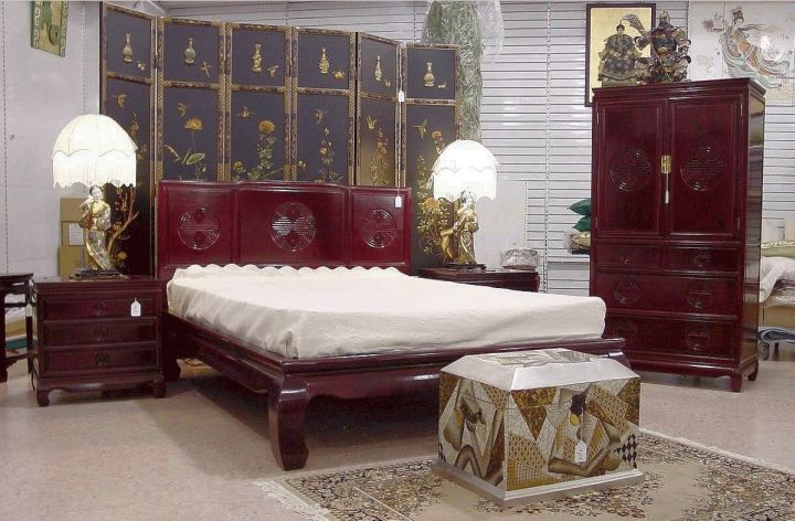 Asian bedroom with separator as wall panel