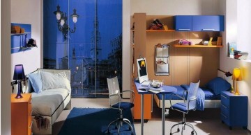 Boys room color with blue rug and bedding