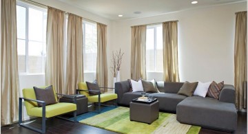 Grey and Green living rooms with dark wooden floor