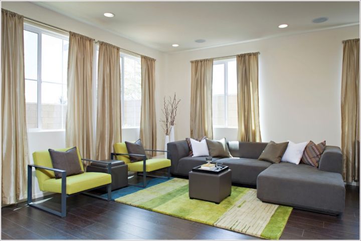 Grey and Green living rooms with dark wooden floor