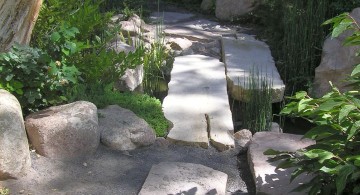 Japanese landscape design with stone bridge