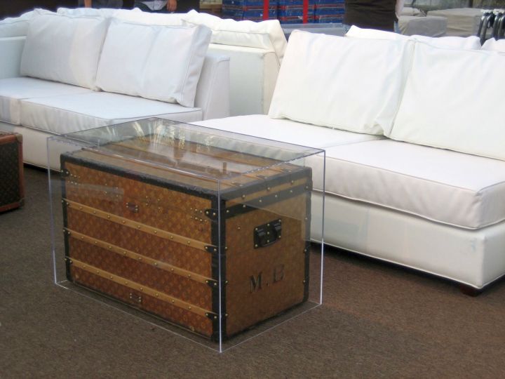 LV in acrylic trunk coffee table