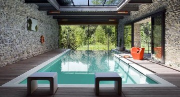 Luxurious Enclosed Swimming Pool Surrounded by Naturally Textured Wall