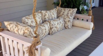 Outdoor swinging beds in white