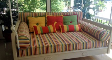 Outdoor swinging beds rainbow stripes