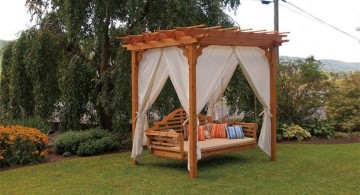 Outdoor swinging beds with curtains