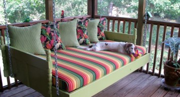 Outdoor swinging beds with rainbow and flowers