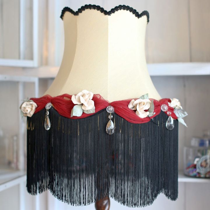 Rosette lamp shade with black fringe