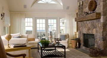 Tuscan living room decor with stone fireplace