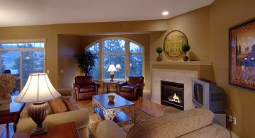 Tuscan living room decor with white fireplace