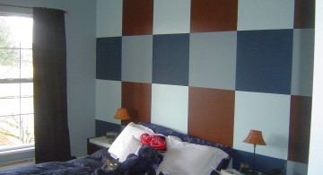 brown and blue bedroom with checkered panel