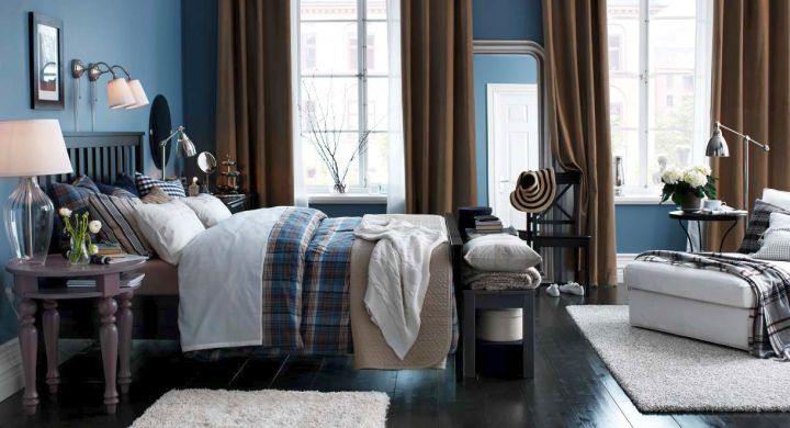 brown and blue bedroom with dark wood floor