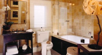 brown bathrooms with unique lamp