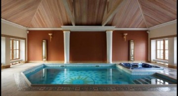 enclosed swimming pool with rustic ceiling