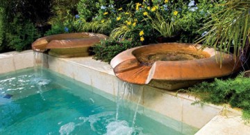 featured image of pools with waterfalls coming down from rustic twin bowls