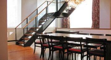 floating wood staircase with black railings