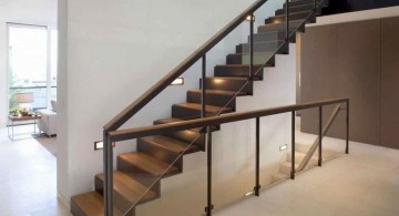 floating wood staircase with black steel railings