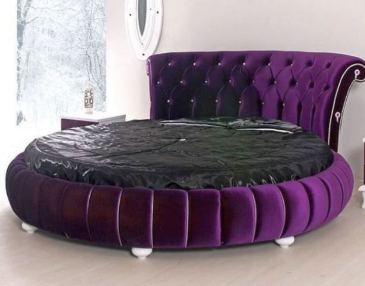 bed frame on purple mattresses